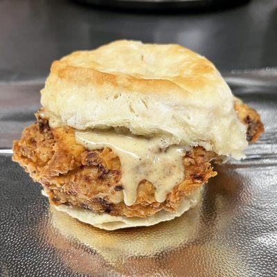 Spicy chicken & biscuit with our homemade tangy white sauce!