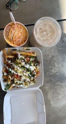 Steak Chili Fries, corn in a cup, and horchata