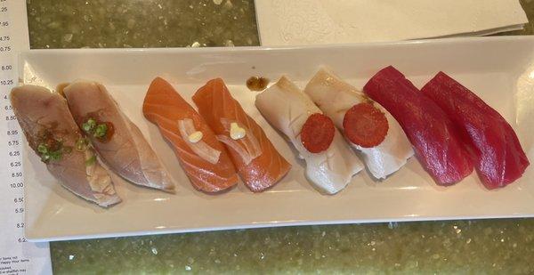 Albacore, salmon, white tuna, and tuna nigiri.