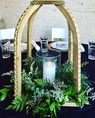 We created finishing touches to a rehearsal dinner's tables & entry at a local venue last month!