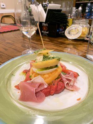 Heirloom tomatoes fresh mozzarella roasted and prosciutto