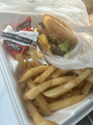 Cheeseburger and fries to go.