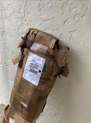 This is a close-up of the package I refused. I spoke to a UPS representative who said they would deliver the damaged item today, as