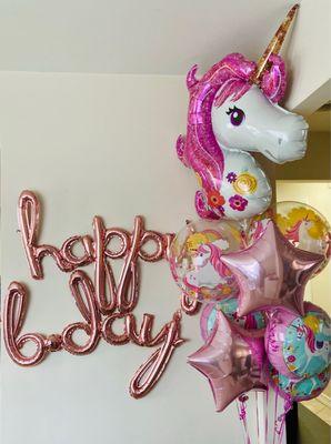 Unicorn balloon bundle and happy bday balloon sign (which they inflated and bagged up for me!!)