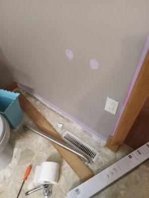 Towel rack and toilet paper holder hD to be moved for Grab bar installation.