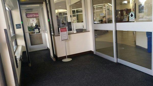 Security desk/metal detector before entering the emergency entrance.