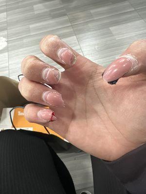 This is what she did when she was trying to prove her point of the MetroCard and nail clippers being able to take the acrylic off easier.