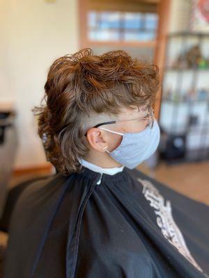 Women's modern mullet with skin fade by Oz