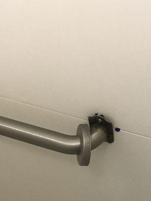 Loose bathtub hand rail