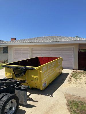 Dropping off a dumpster rental in Baldwin Hills,ca