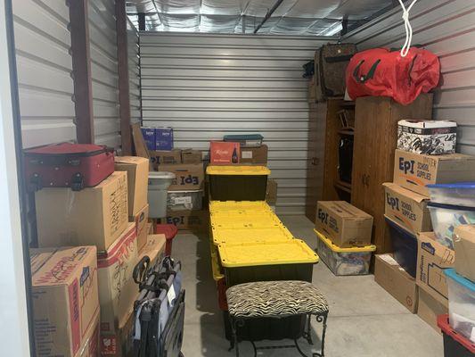 Placed furniture in a storage unit and organized it.