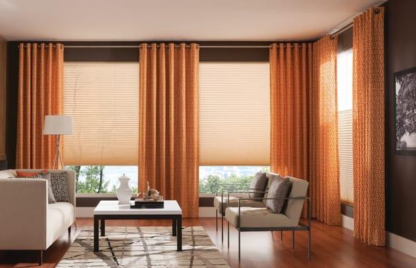 Curtains with fun patterns and funky colors are always a great way to liven up your living spaces.