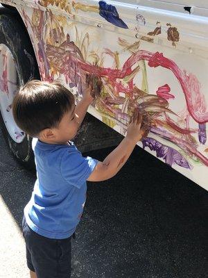 Summer time has special activities like this one - paint a bus!