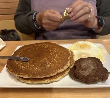 Buttery Vanilla Pancakes!  Two over easy eggs!  Deeeelishes sausage patties!