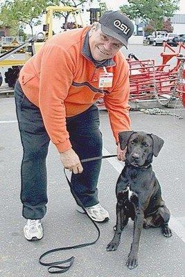 Volunteer, Bill, at an adoption site