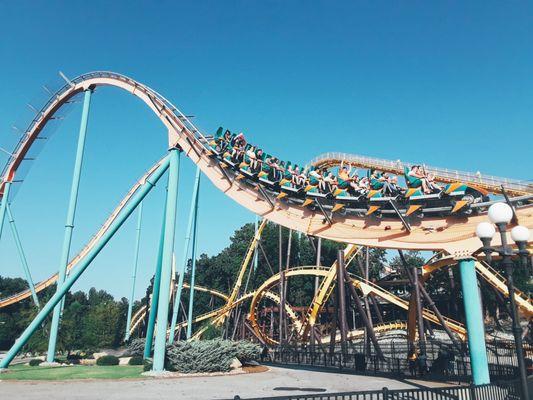 A train on Goliath exits an airtime hump on its return trip to the station! Note the Georgia Scorcher in the background