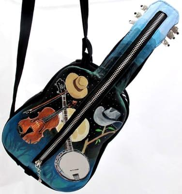 We have fine paintings on the guitar purse which makes them wearable art. Our music handbags are the gifts you need.