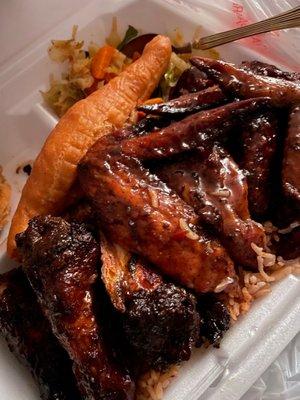 Jerk Wings, rice and coco bread