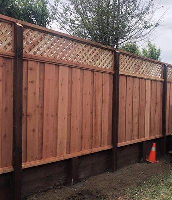 Privacy lattice with 2' retaining wall.