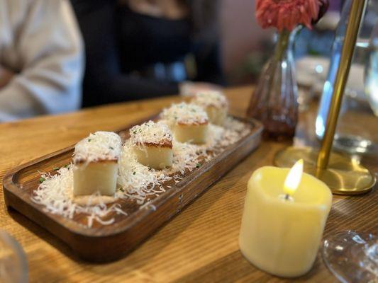 Thousand-Layer Crispy Potato Pave Shaved Pecorino Cheese, Bravas Sauce, Chives