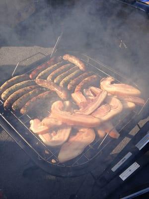 Sausage and thick cut smoked bacon at my jets tailgate 12.1.13