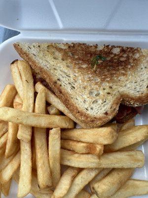 Half of a pastrami high with fries - it was a whole sandwich but I asked them to cut it in half so I could share with my son