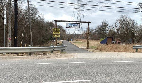 The entrance can be hard to see from the road. It is right beside the railroad tracks.