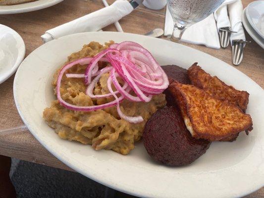 Classic Dominican Breakfast, mangu with salami and fried cheese