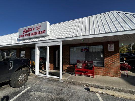 The restaurant is located in the right third of a small building