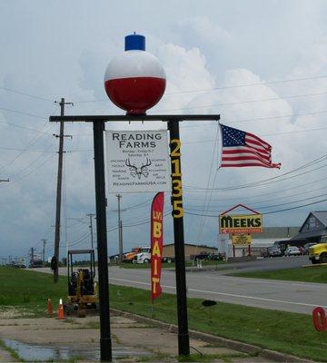 Our new sign complete with 4ft diameter fishing bobber