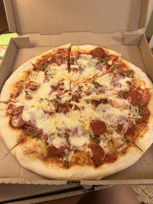 Medium Meat Lovers Pizza   15" Medium.... Barely any cheese. Barely any meat just dough. Waste of money.