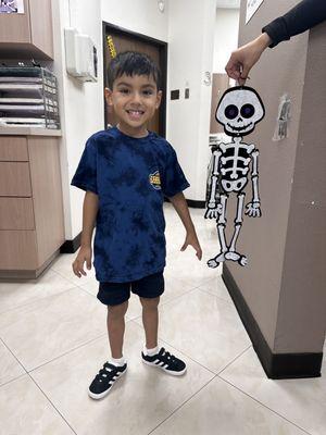 Levi next to Mr. Skeleton