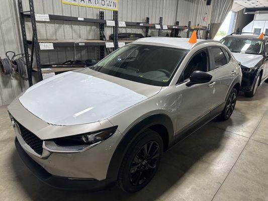 Brand new Mazda's that have been delivered for us to repair before going back to the dealership. Only OEM repair procedures may be done.