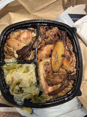 Jerk chicken and beans and rice and cabbage