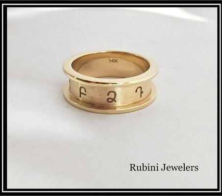 Custom handmade flat, rimmed ring, laser engraved in Armenian, by Rubini Jewelers