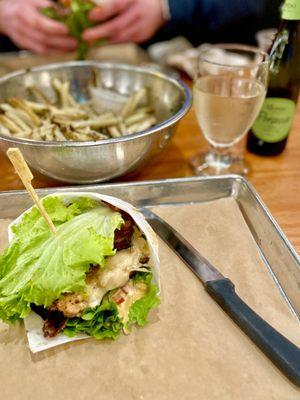 Thunderbird lettuce wrapped, truffle parm fries, and Prosecco