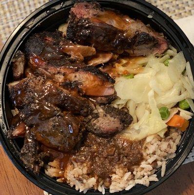 Jerk Pork, rice n peas, oxtail gravy, vegetables.