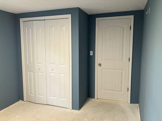 We added a closet and 2 hanging bars to this room that previously didn't have a functional closet. We also replaced all the drywall.