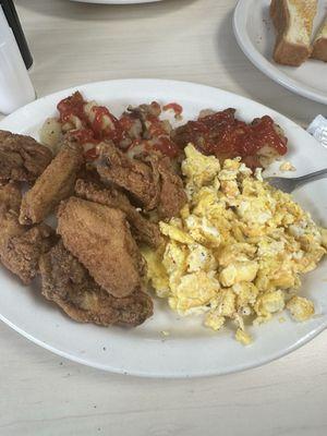 Wings, eggs, and home Fries breakfast