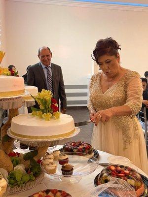 Cutting her cake Angeleno Hall