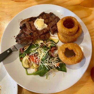 Ribeye Steak. Served with two sides and your choice of a trip to the salad bar or homemade soup. Perfectly cooked to our request.