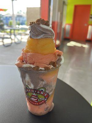 Build your own: mango Italian ice, Bahama breeze Italian ice with swirl ice cream and biscotti cookie butter crumbles