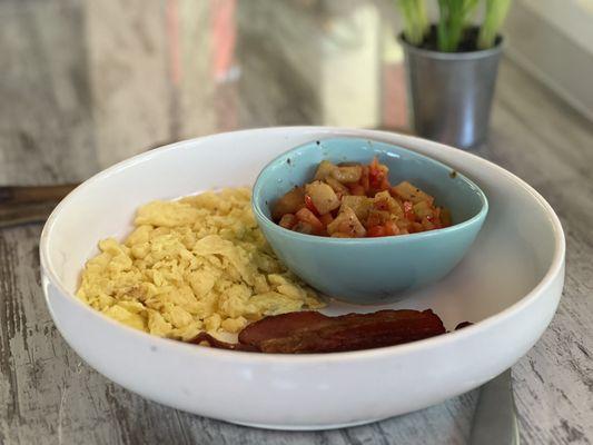 Nothing like a great breakfast to start the day  Scrambled eggs, bacon and potato's.