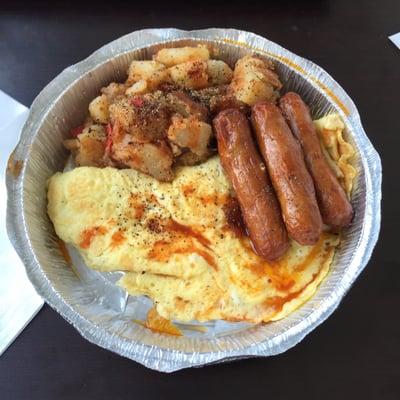 Texas Omelette with sausage cooked to absolute perfection.  Every mouth watering bite is amazing and this is no understatement!