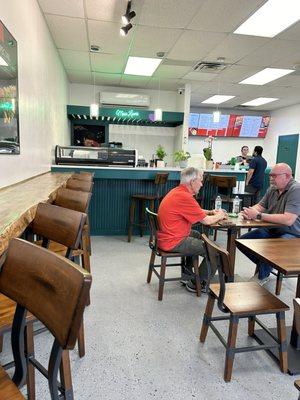 Order counter, sushi preparation station, and seating