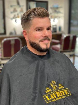 Fade, cut, beard trim, and beard line-up by James Terry. Finished off with LAYRITE Clay Cement and LAYRITE Beard Oil.