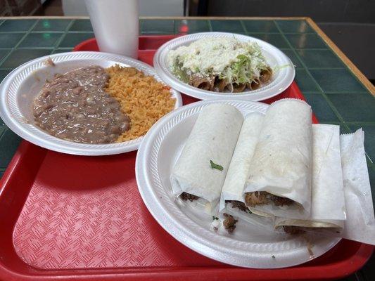 Rice & beans, beef flautas, tacos (carnitas and carne asada).