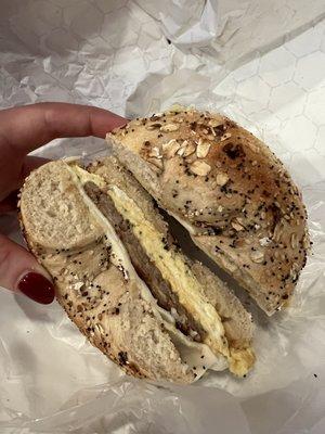 Egg, chicken sausage and cheese on everything bagel