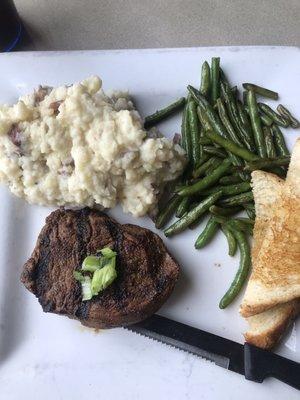 Sirloin lunch special with garlic mashed potatoes and sautéed green beans.