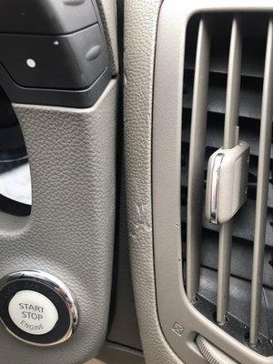 Obvious pry marks after dash around push start was replaced. (Pry marks/puncture) -notice not there in pics taken when dash was cracked.